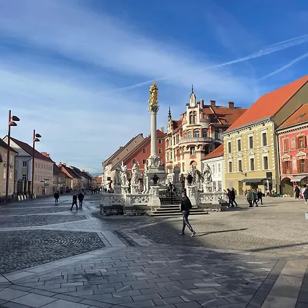 Old Town's Legend: Center With Balcony