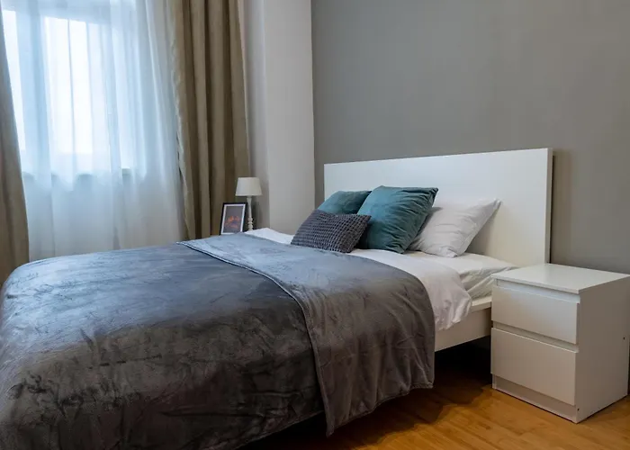 Old Town's Legend: Center With Balcony